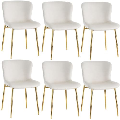 Silla de comedor tapizada en beige con patas doradas