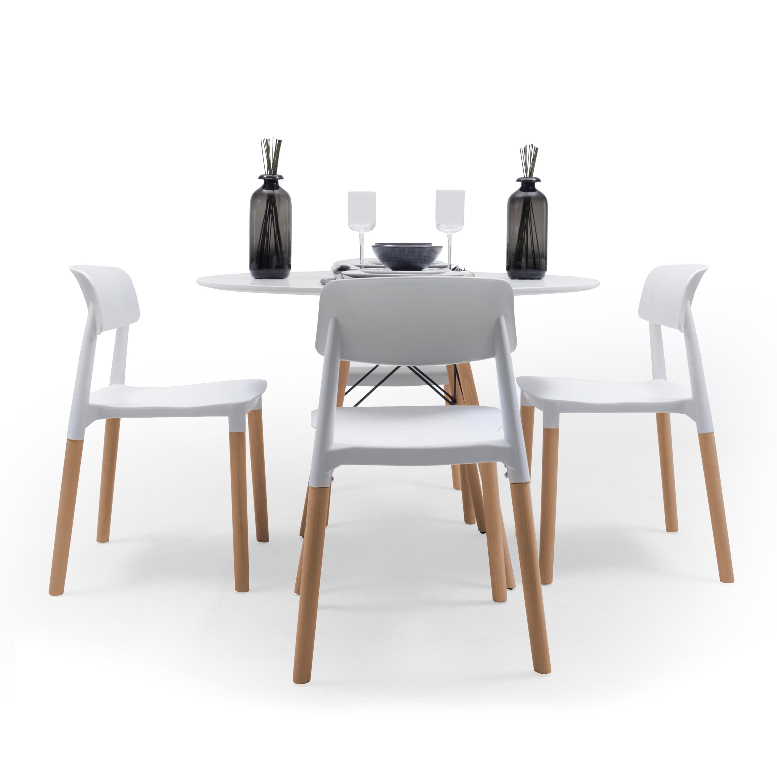 Conjunto de mesa redonda blanca con sillas de diseño nórdico