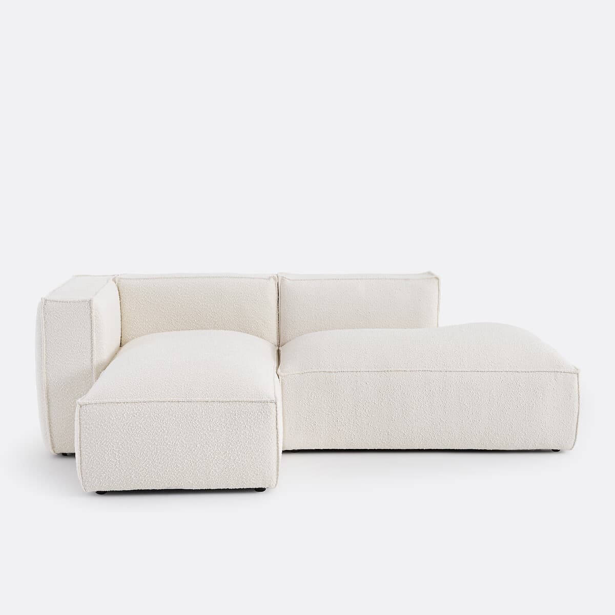 Sofá modular esquinero tapizado en bouclé blanco