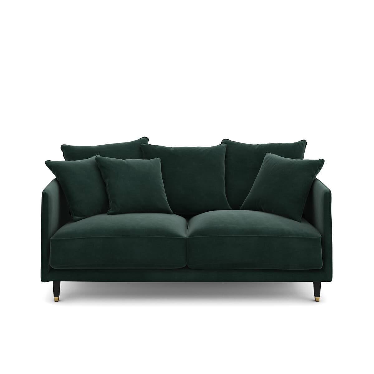 Sofá de terciopelo verde esmeralda con cojines