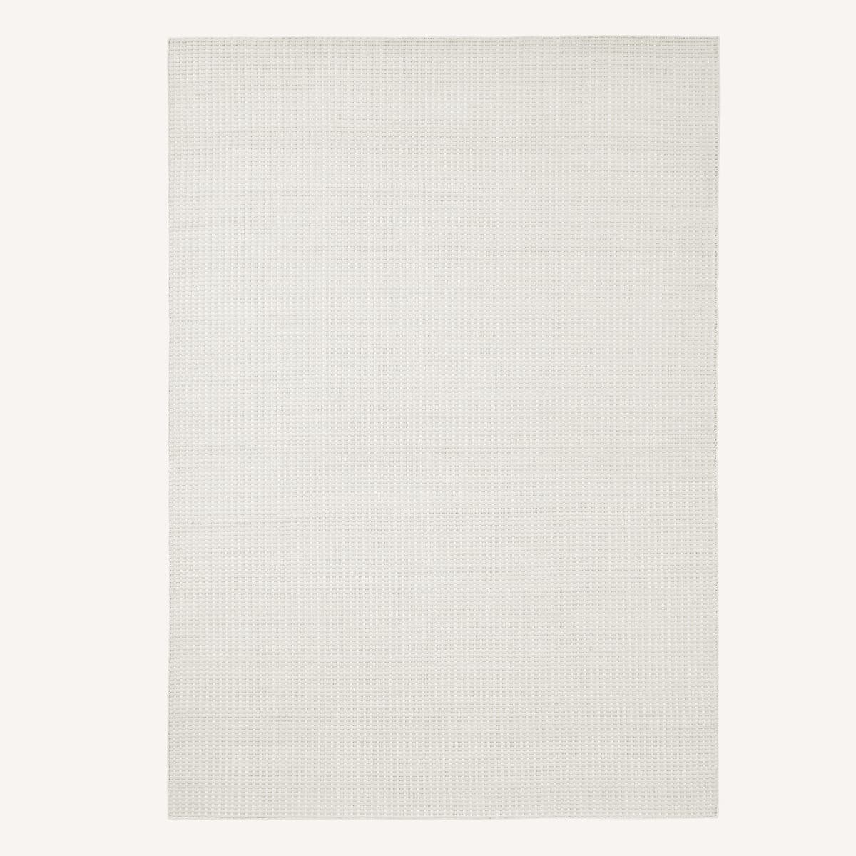 Alfombra de tejido gofrado color crema