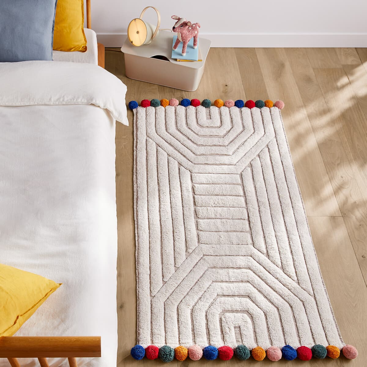 Alfombra de algodón con pompones multicolor