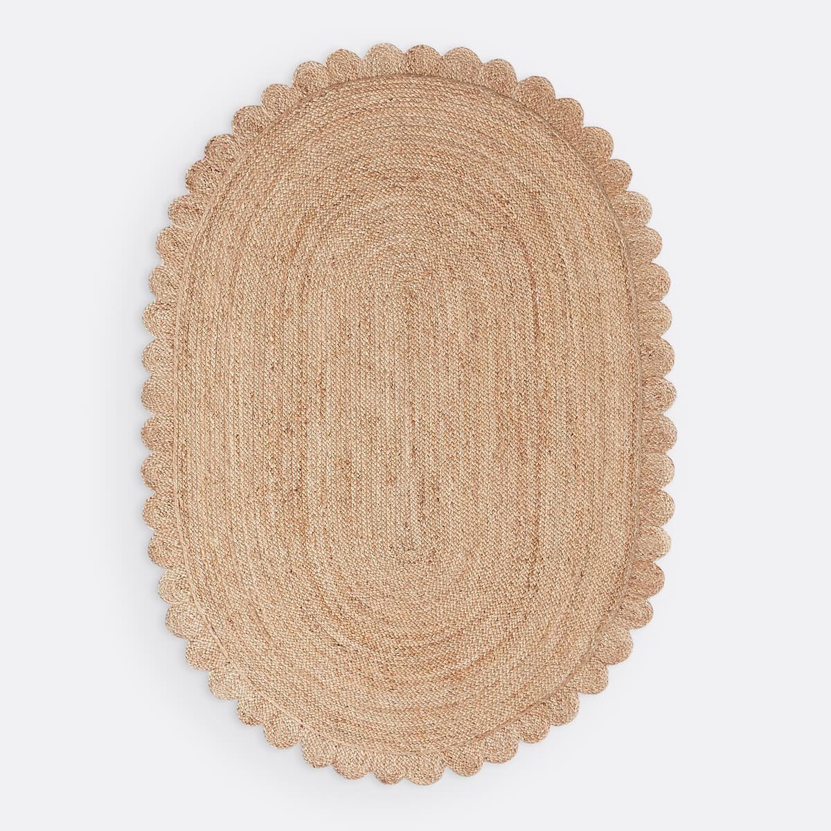 Alfombra ovalada de yute con borde ondulado