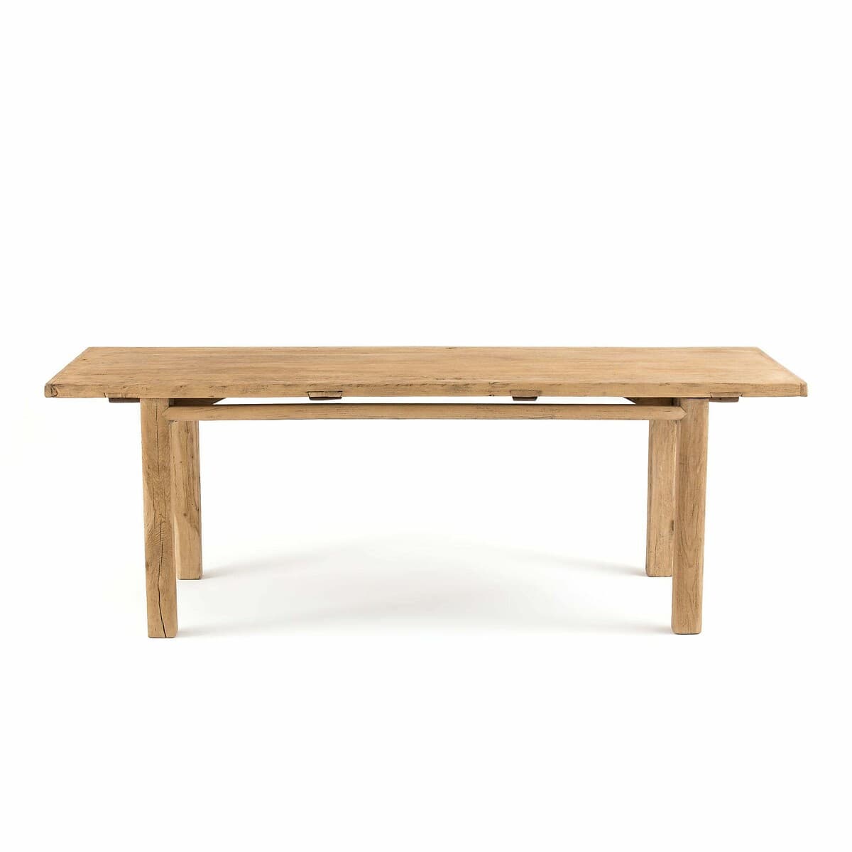 Mesa de comedor rectangular de madera clara